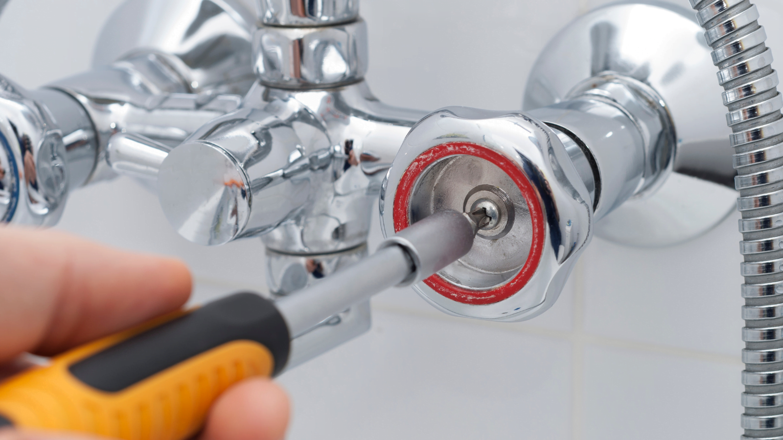 repairing a leaky bath faucet